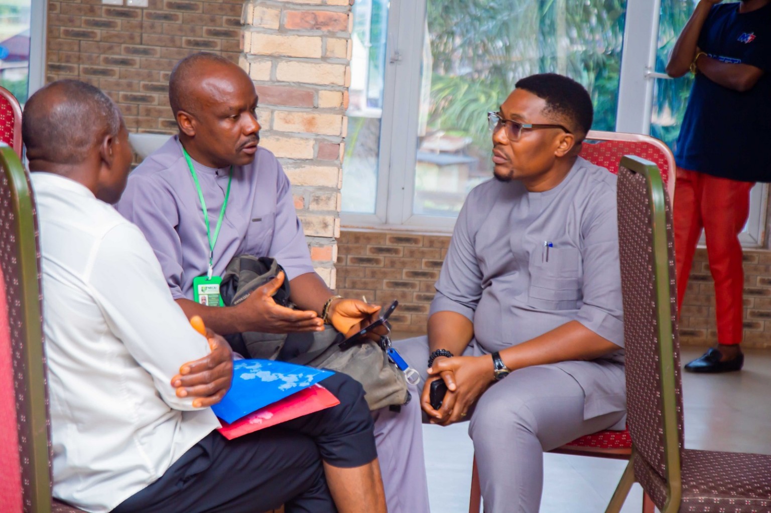 Ugwu Chinedu in discussion with MainPower representatives